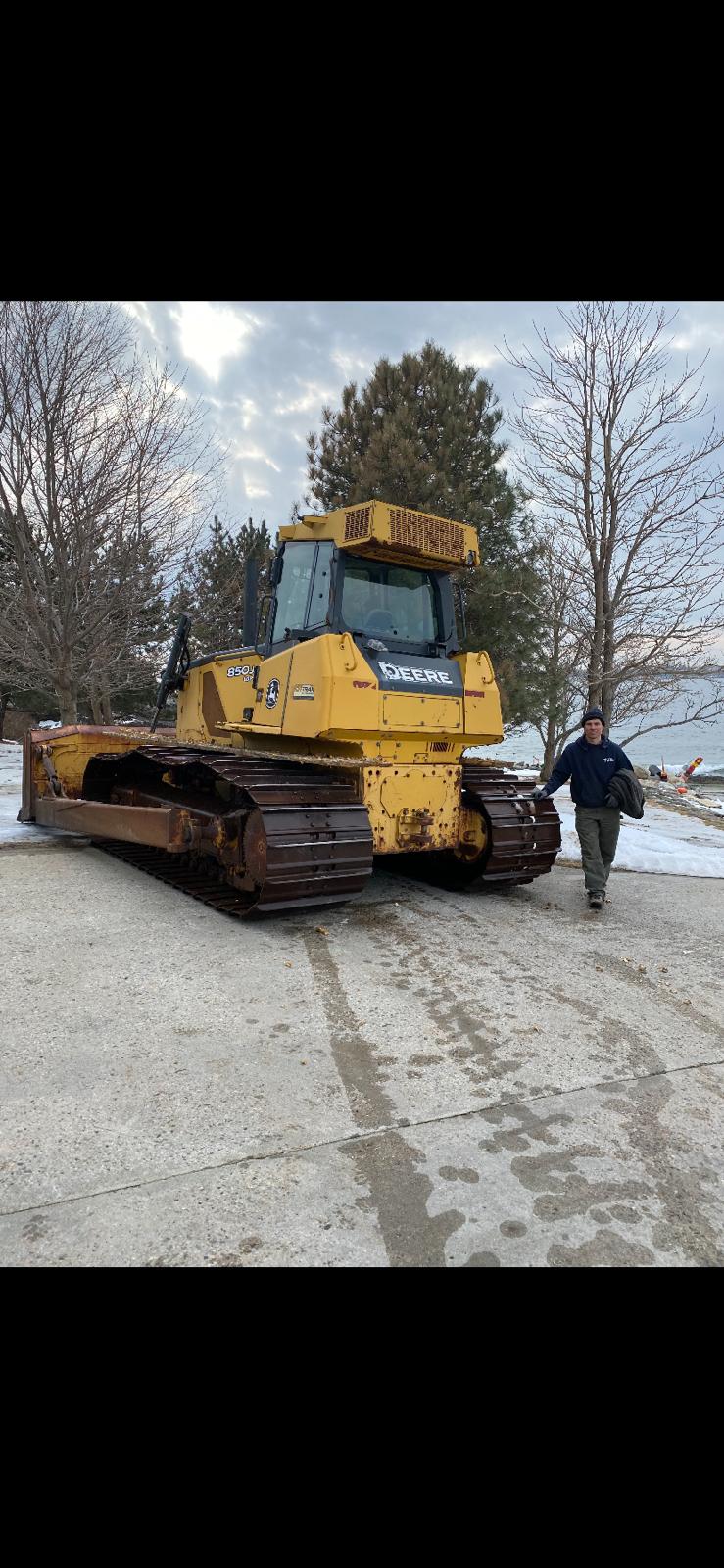 John Deere 850J Bulldozer Clearing Land